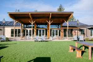 View of the main building from the ceremony lawn area at Abbey Road Farms in Carlton, Oregon