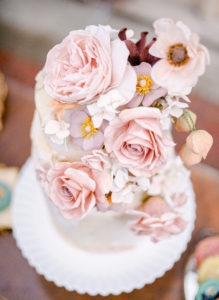 Beautiful wedding cake with mauve color roses at Lairmont Manor in Bellingham, WA