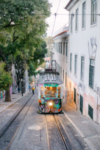 Tree line and city view with cable car located in the down town Lisboa Portugal. 