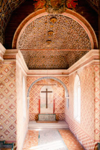 Moorish style arch and a cross in the center. the inside of the arch or so called church located in Penha Palace in sintra, PortugalThis was located in Sinta, Portugal. 